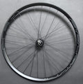 Front wheel: SONdelux 12mm Dynamo Centerlock Disc hub & HED G Rim 28H